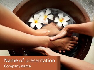 A Group Of People Holding Hands Over A Bowl Of Water With Flowers PowerPoint Template