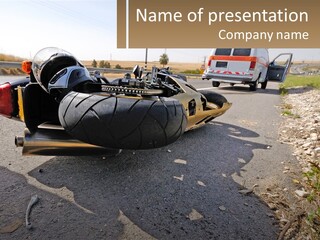 A Motorcycle That Is Laying Down On The Side Of The Road PowerPoint Template
