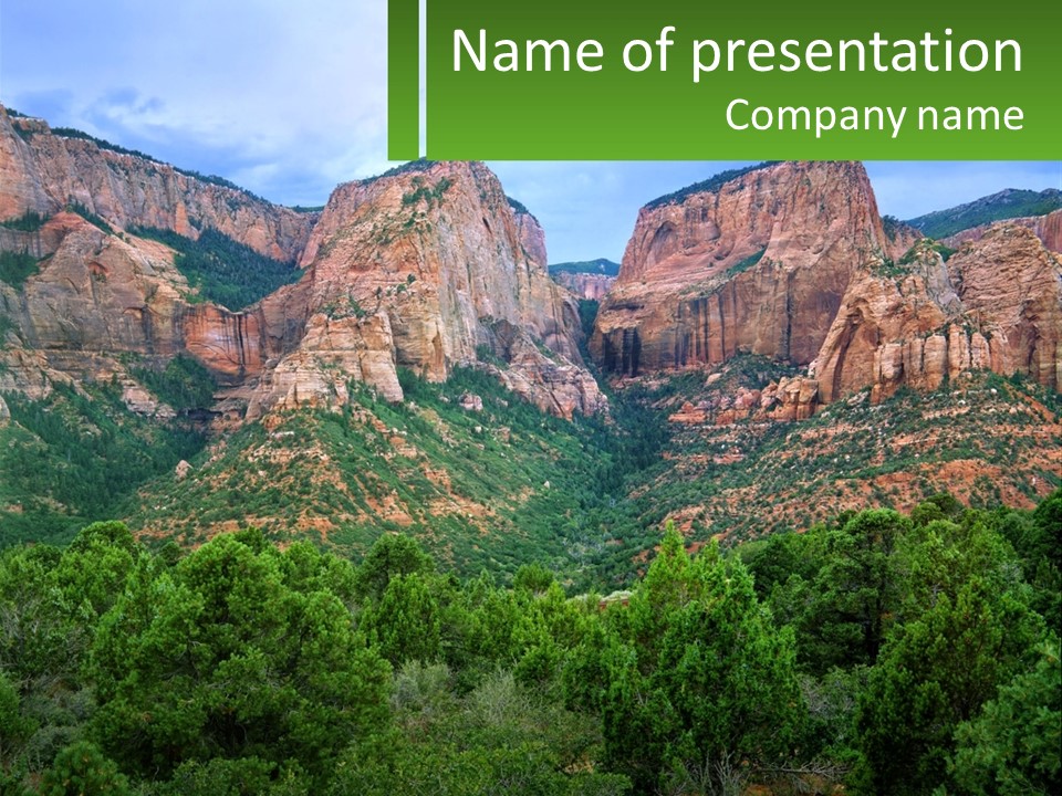 A Mountain Range With Trees And Rocks In The Background PowerPoint Template