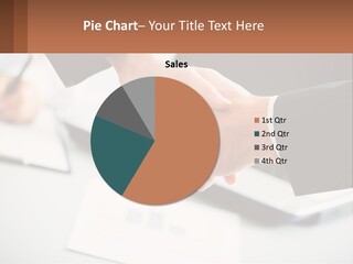 Two People Shaking Hands Over A Laptop Computer PowerPoint Template