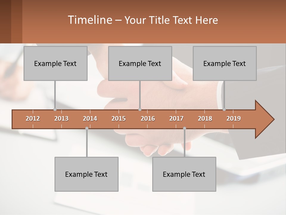 Two People Shaking Hands Over A Laptop Computer PowerPoint Template