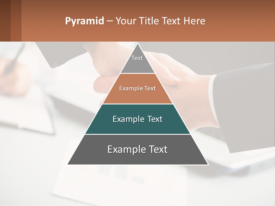 Two People Shaking Hands Over A Laptop Computer PowerPoint Template