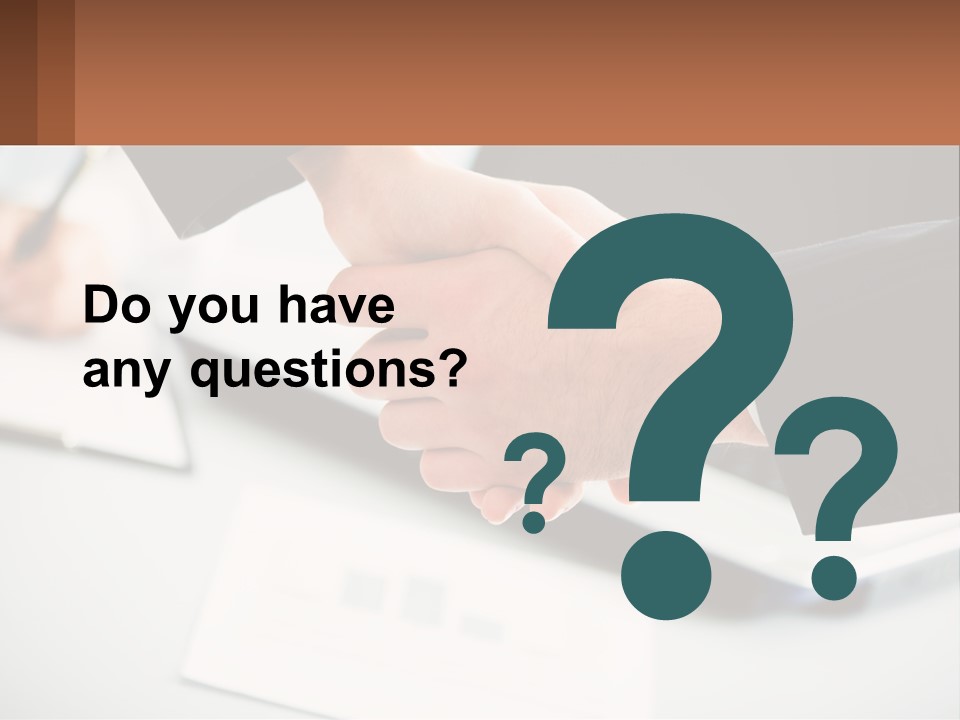 Two People Shaking Hands Over A Laptop Computer PowerPoint Template