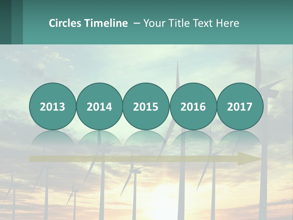 A Group Of Windmills With The Sun Setting In The Background PowerPoint Template