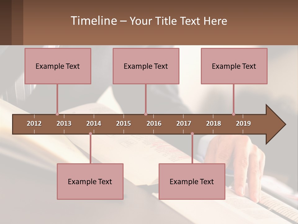 A Man In A Suit Is Typing On A Computer PowerPoint Template