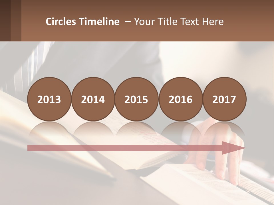 A Man In A Suit Is Typing On A Computer PowerPoint Template