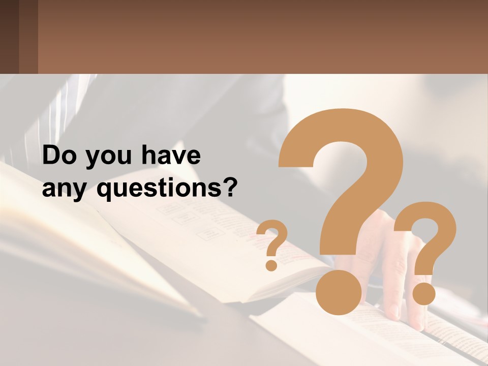 A Man In A Suit Is Typing On A Computer PowerPoint Template