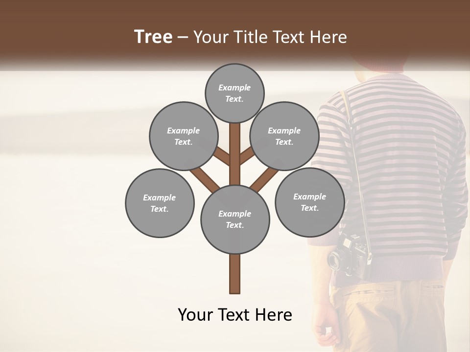 A Man Standing On A Beach With A Camera PowerPoint Template