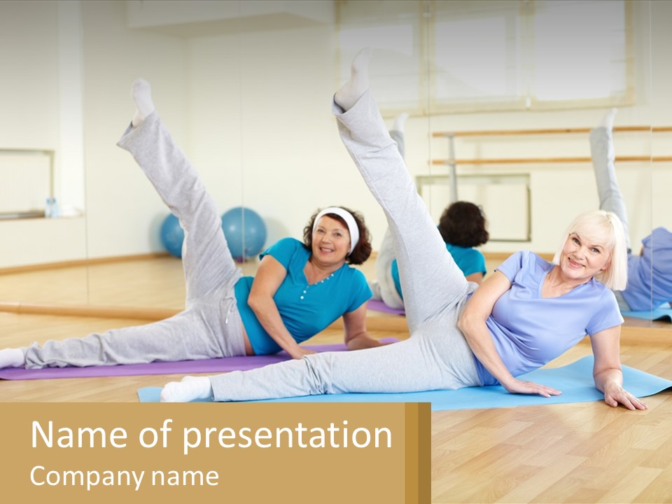 A Group Of Women Doing Yoga In A Gym PowerPoint Template