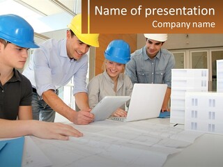 A Group Of People In Hard Hats Looking At A Laptop PowerPoint Template