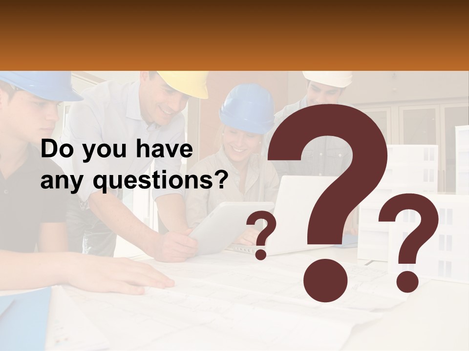 A Group Of People In Hard Hats Looking At A Laptop PowerPoint Template