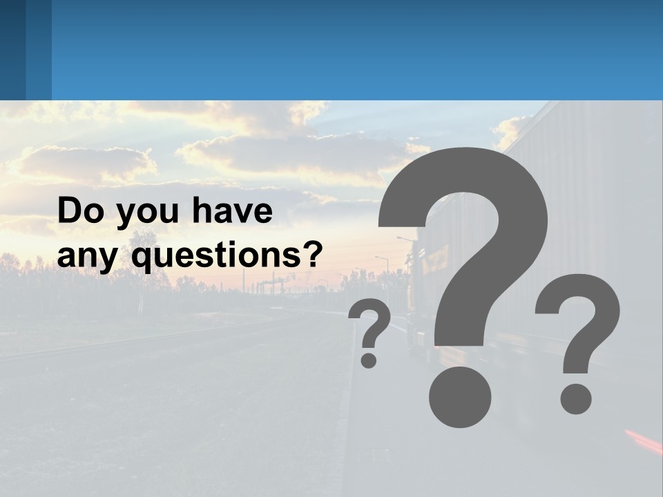 A Truck Driving Down The Road With A Sunset In The Background PowerPoint Template