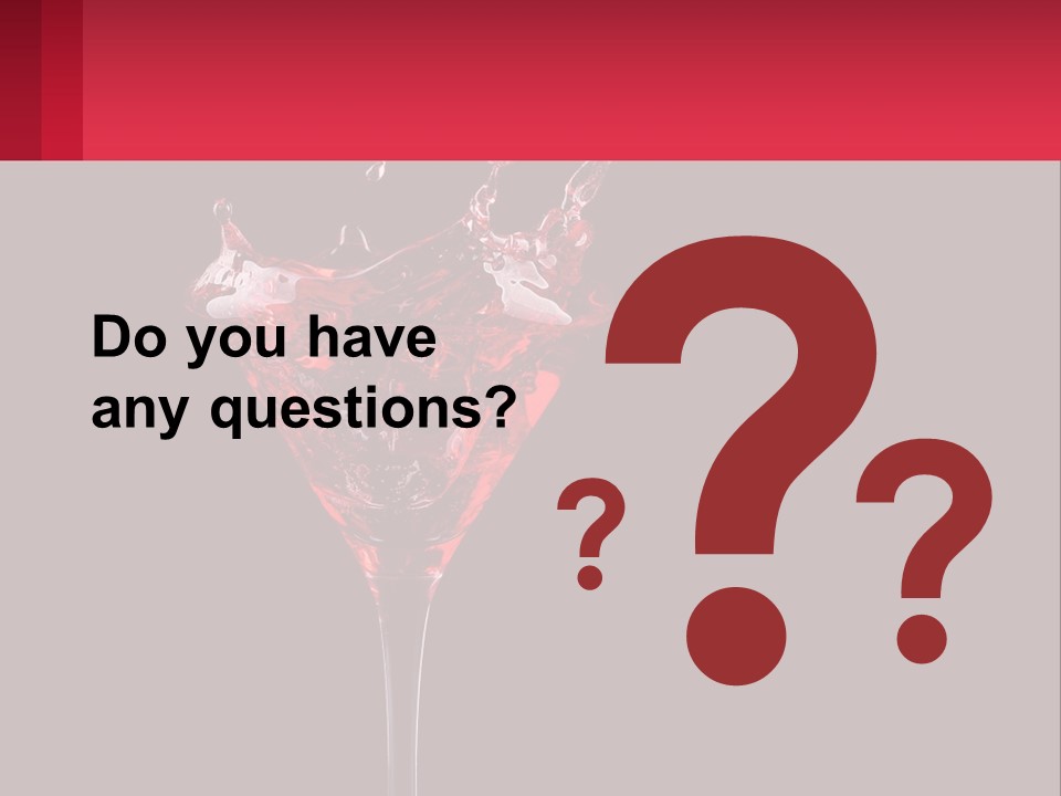 A Red Drink Splashing Into A Martini Glass PowerPoint Template