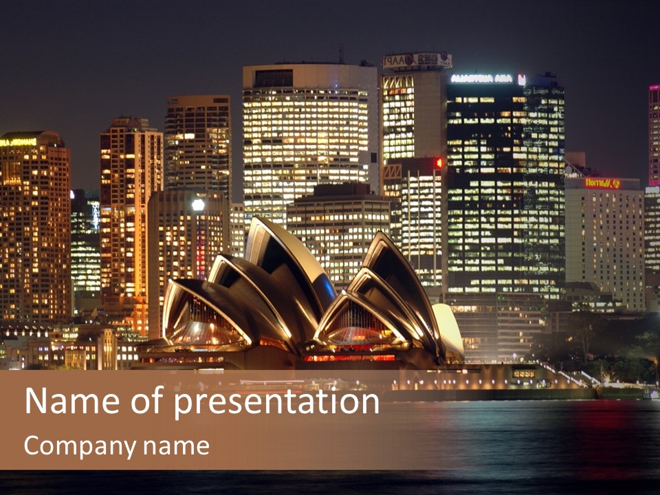 A Picture Of A City At Night With The Sydney Opera House In The Foreground PowerPoint Template