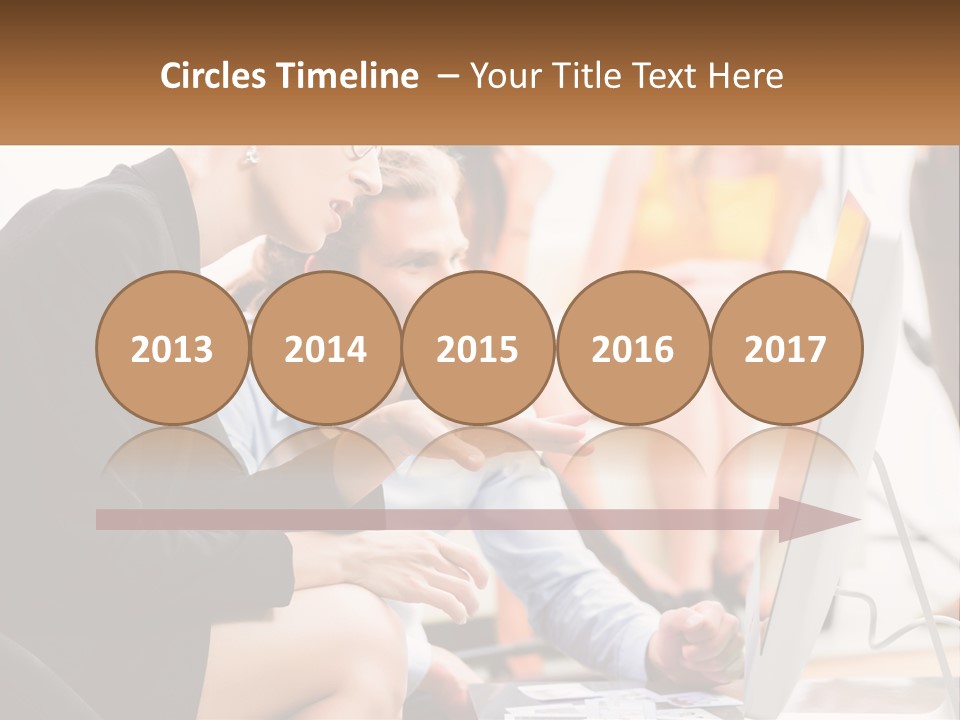 A Woman Pointing At A Computer Screen While A Man Looks At It PowerPoint Template