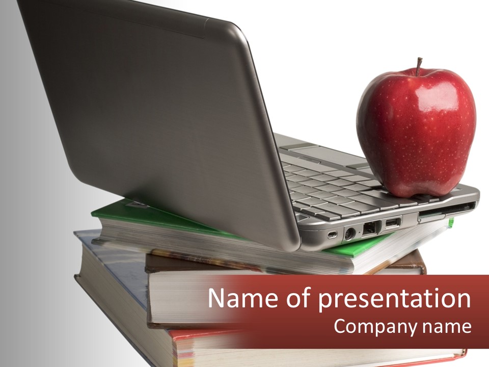 A Laptop Computer Sitting On Top Of A Pile Of Books PowerPoint Template