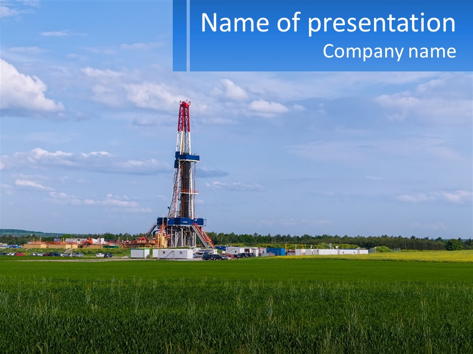 A Drilling Rig In The Middle Of A Field PowerPoint Template