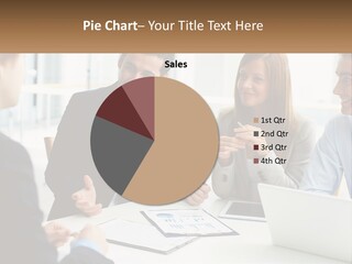 A Group Of People Sitting Around A Table Talking PowerPoint Template
