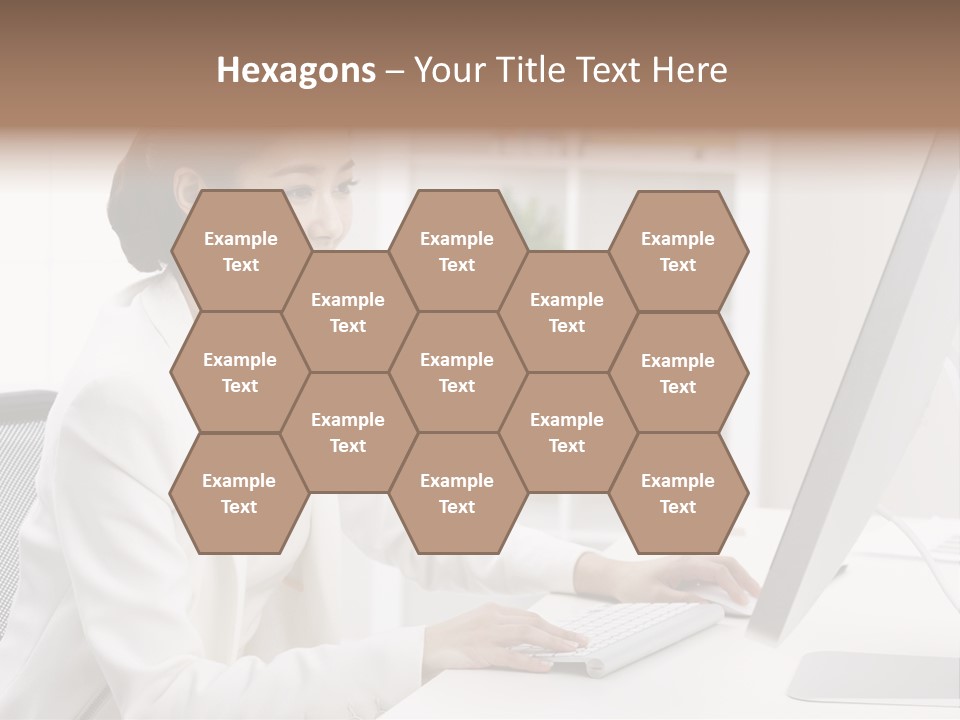 A Woman Sitting At A Desk Using A Computer PowerPoint Template