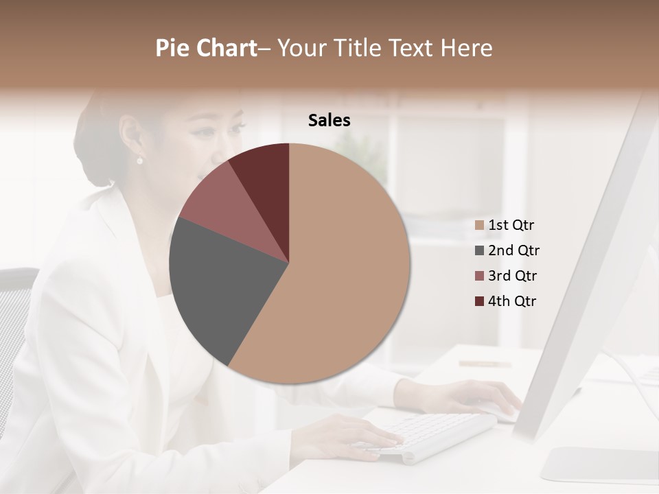 A Woman Sitting At A Desk Using A Computer PowerPoint Template
