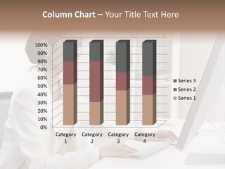 A Woman Sitting At A Desk Using A Computer PowerPoint Template
