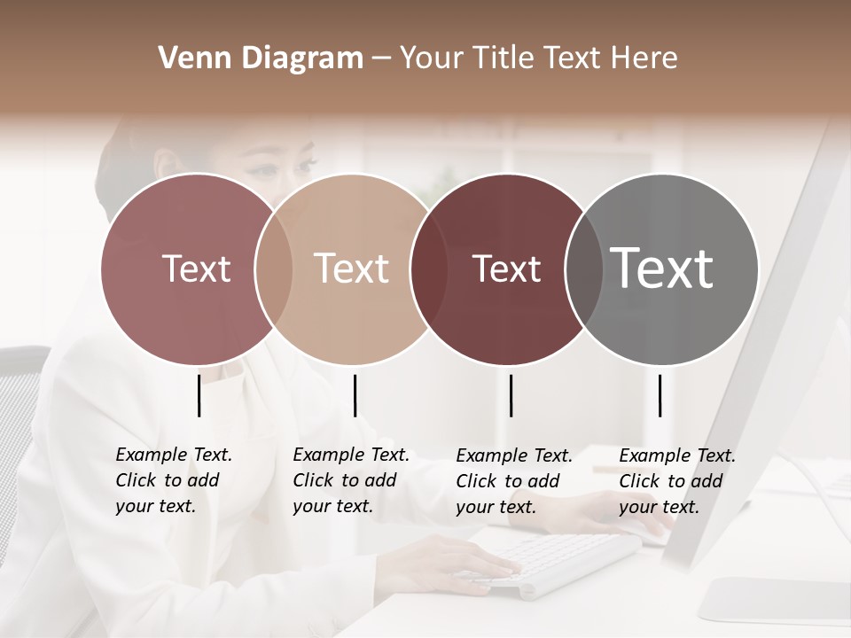 A Woman Sitting At A Desk Using A Computer PowerPoint Template