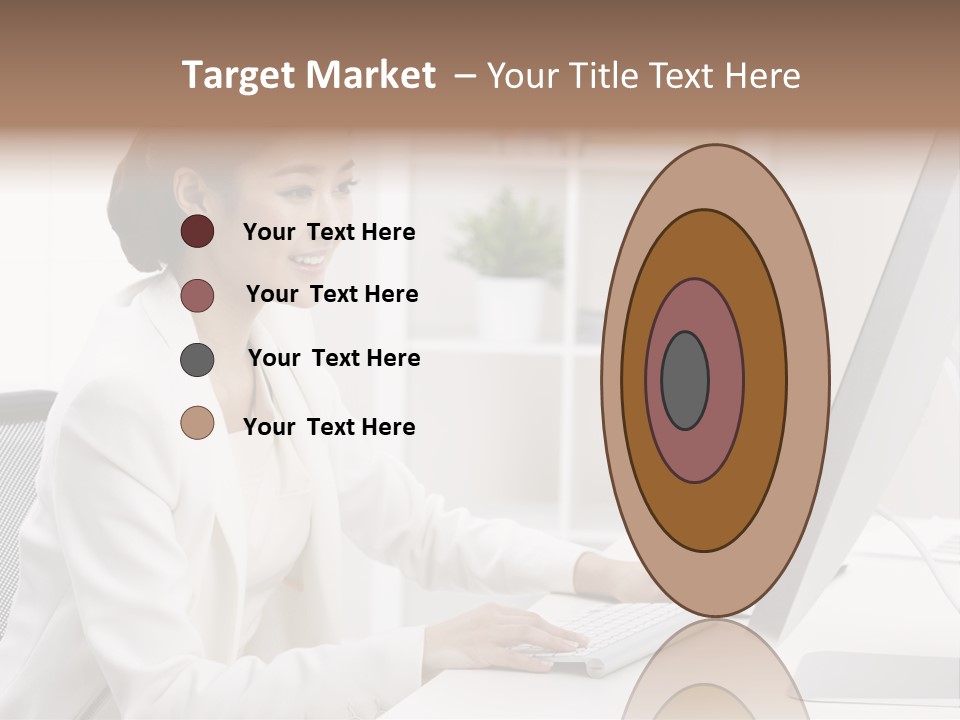 A Woman Sitting At A Desk Using A Computer PowerPoint Template