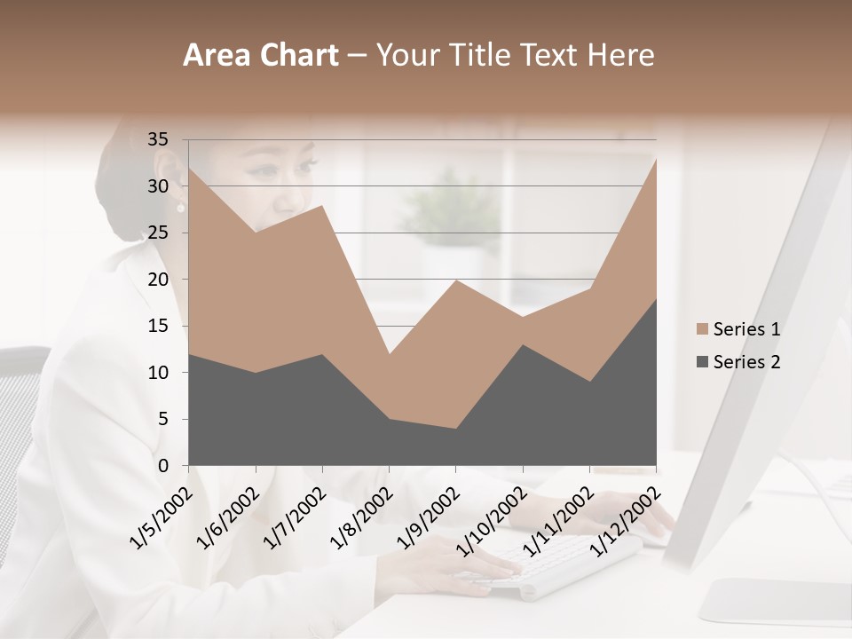 A Woman Sitting At A Desk Using A Computer PowerPoint Template