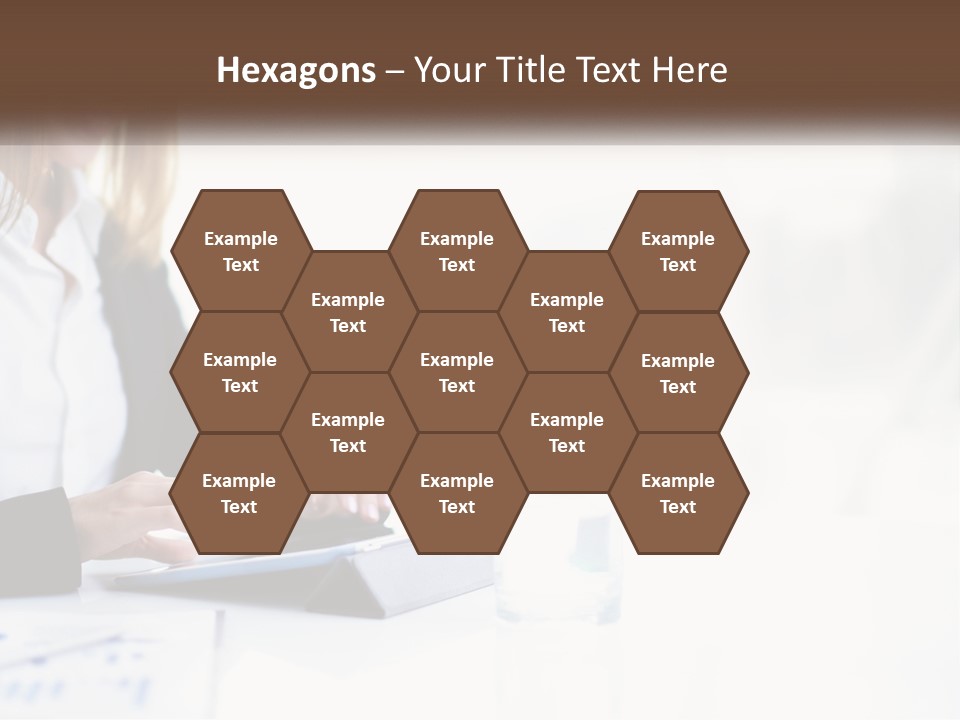 A Woman Sitting At A Table Using A Tablet Computer PowerPoint Template