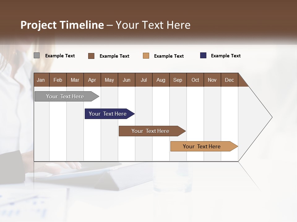 A Woman Sitting At A Table Using A Tablet Computer PowerPoint Template