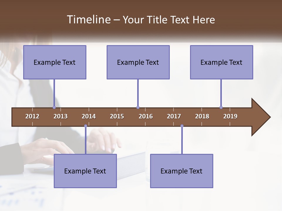 A Woman Sitting At A Table Using A Tablet Computer PowerPoint Template