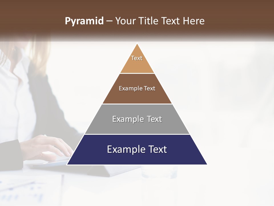 A Woman Sitting At A Table Using A Tablet Computer PowerPoint Template