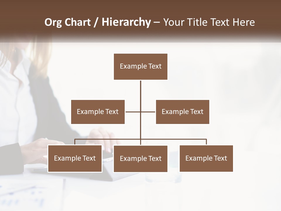 A Woman Sitting At A Table Using A Tablet Computer PowerPoint Template