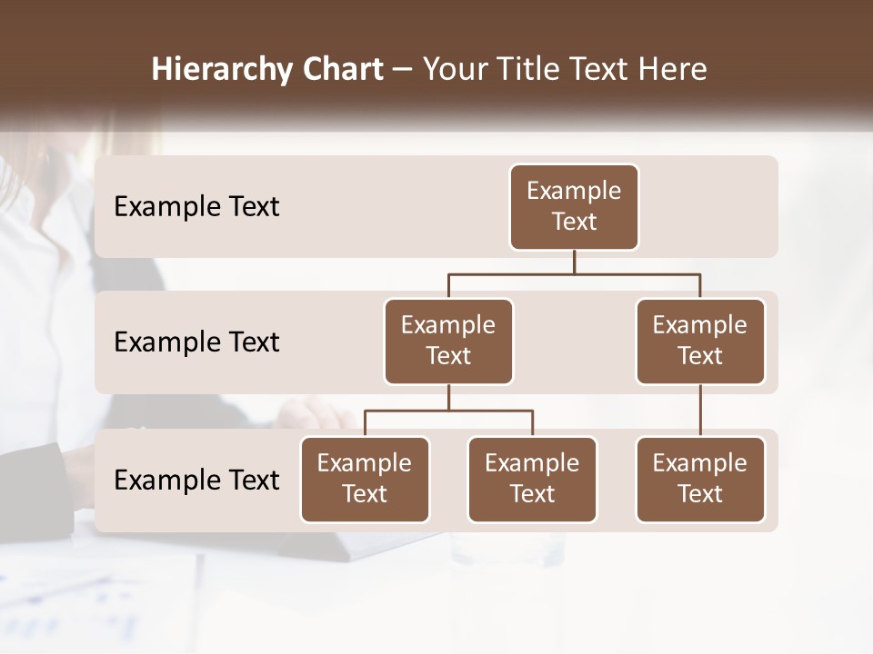 A Woman Sitting At A Table Using A Tablet Computer PowerPoint Template