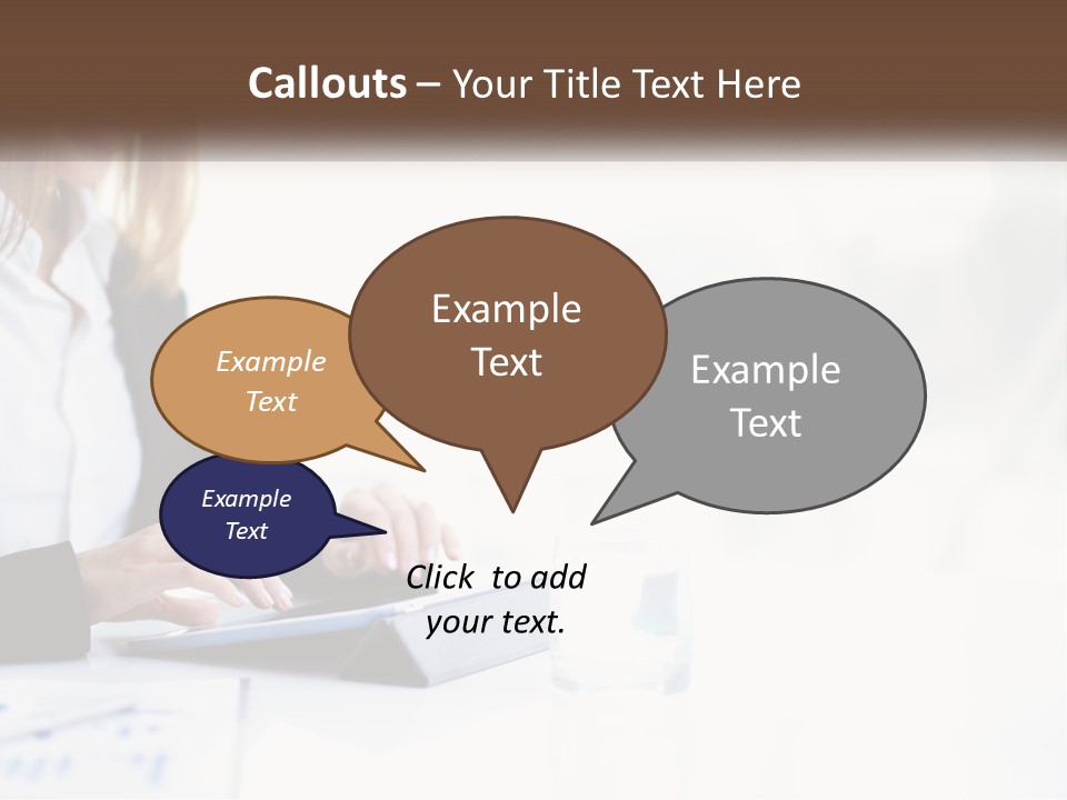 A Woman Sitting At A Table Using A Tablet Computer PowerPoint Template