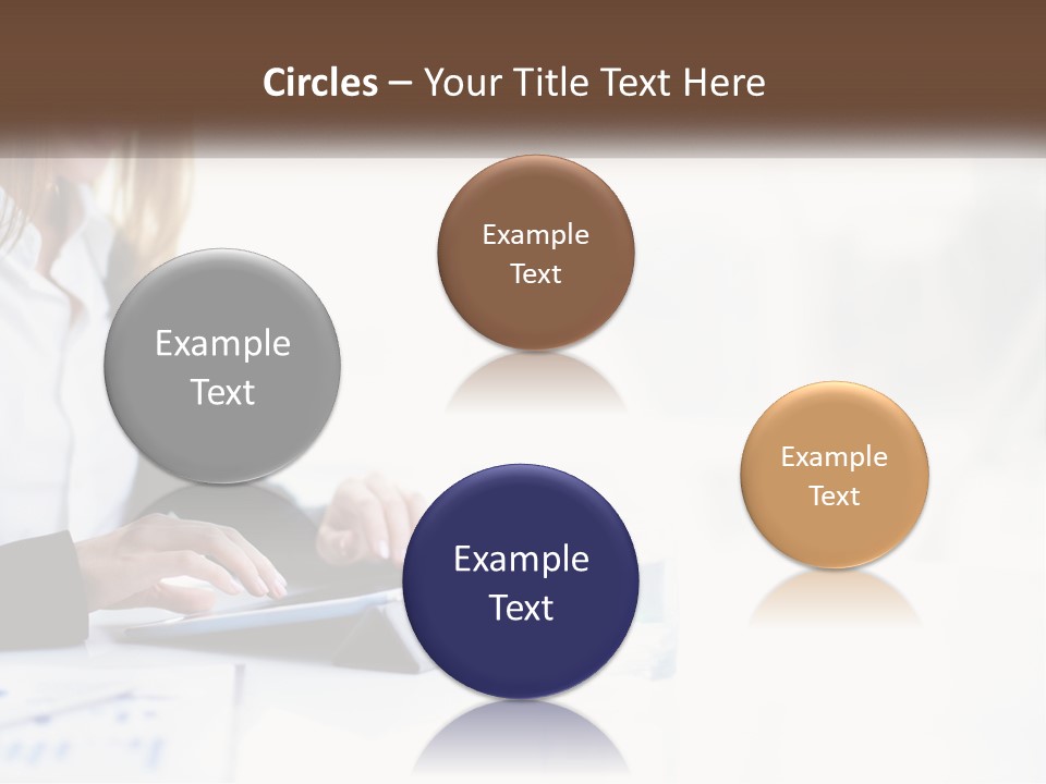 A Woman Sitting At A Table Using A Tablet Computer PowerPoint Template