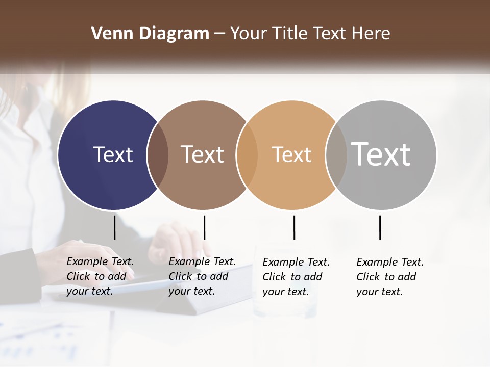 A Woman Sitting At A Table Using A Tablet Computer PowerPoint Template