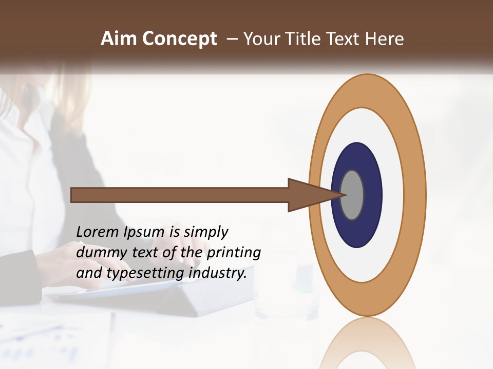 A Woman Sitting At A Table Using A Tablet Computer PowerPoint Template