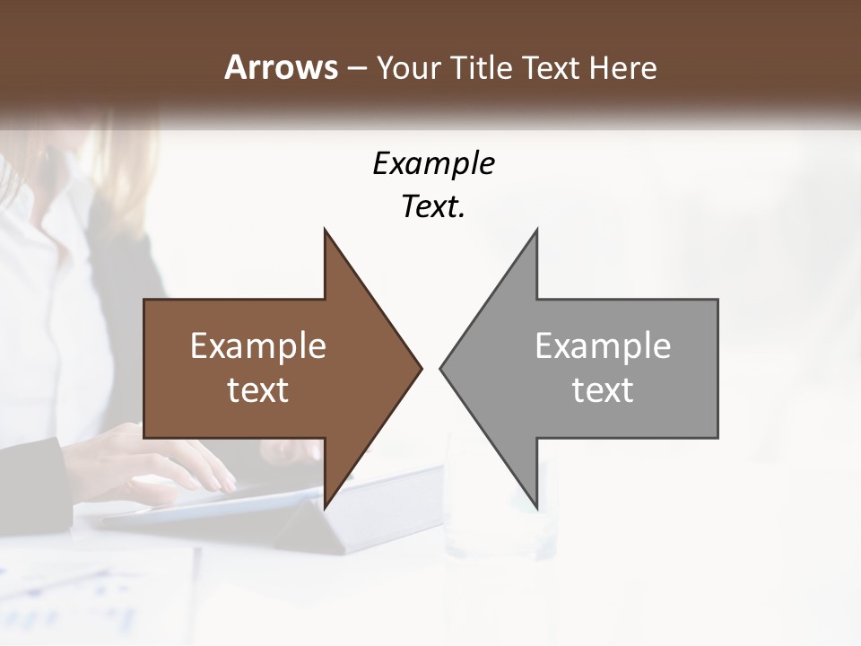 A Woman Sitting At A Table Using A Tablet Computer PowerPoint Template