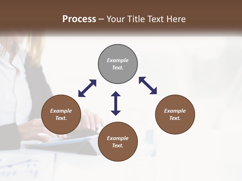 A Woman Sitting At A Table Using A Tablet Computer PowerPoint Template