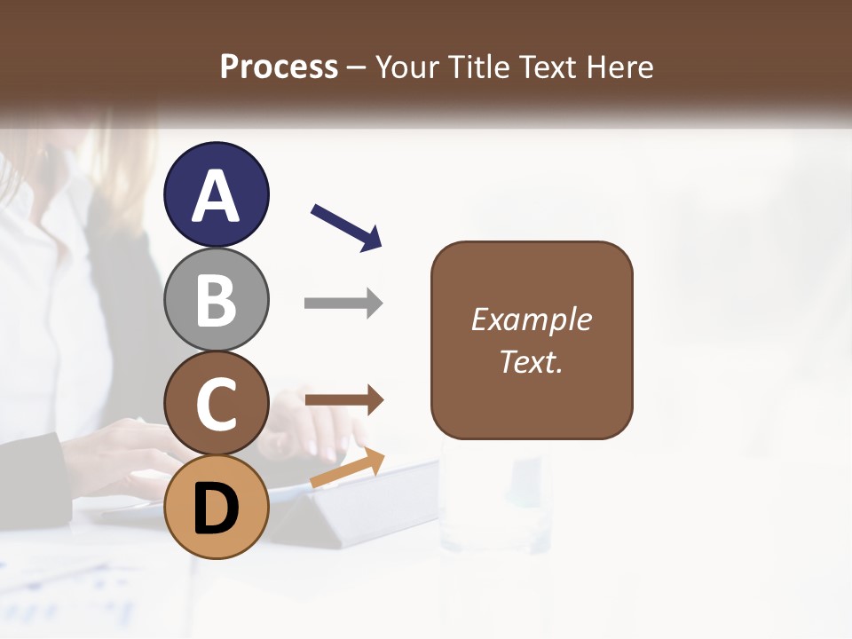 A Woman Sitting At A Table Using A Tablet Computer PowerPoint Template
