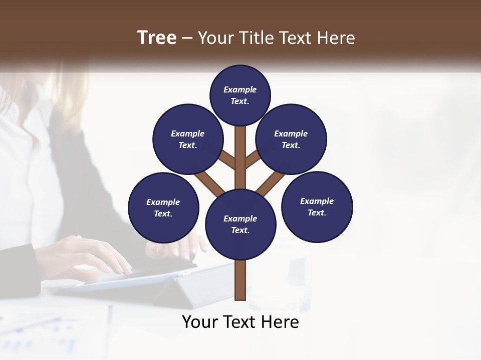 A Woman Sitting At A Table Using A Tablet Computer PowerPoint Template