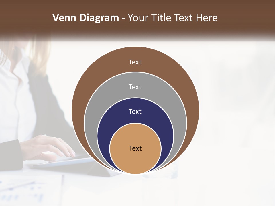 A Woman Sitting At A Table Using A Tablet Computer PowerPoint Template