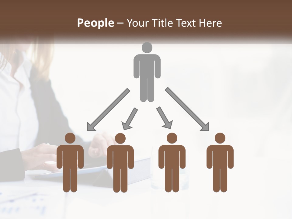 A Woman Sitting At A Table Using A Tablet Computer PowerPoint Template