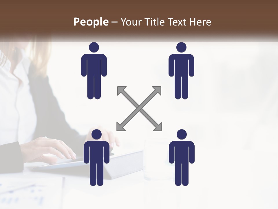 A Woman Sitting At A Table Using A Tablet Computer PowerPoint Template