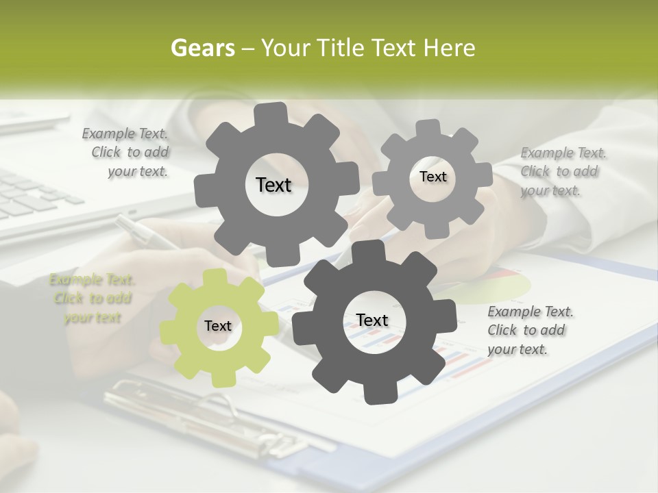 A Group Of People Sitting At A Table With Laptops PowerPoint Template