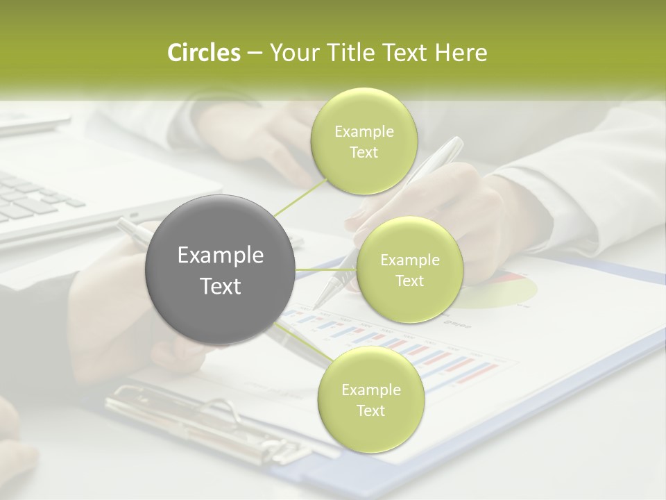 A Group Of People Sitting At A Table With Laptops PowerPoint Template