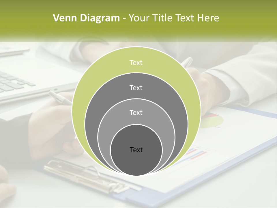 A Group Of People Sitting At A Table With Laptops PowerPoint Template