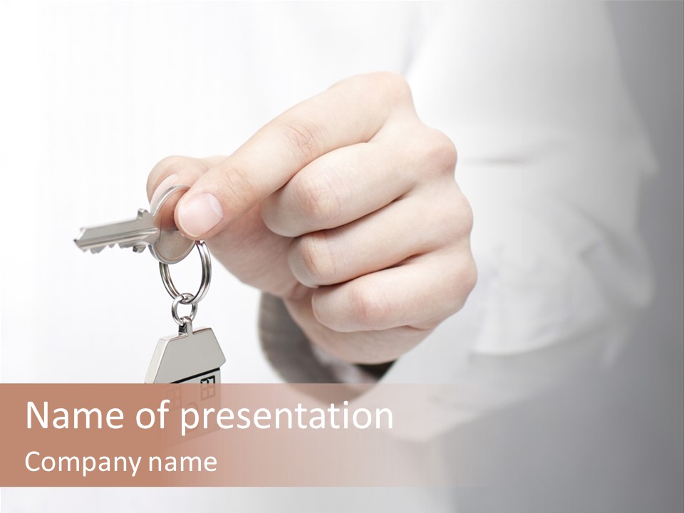 A Person Holding A Key To A House PowerPoint Template