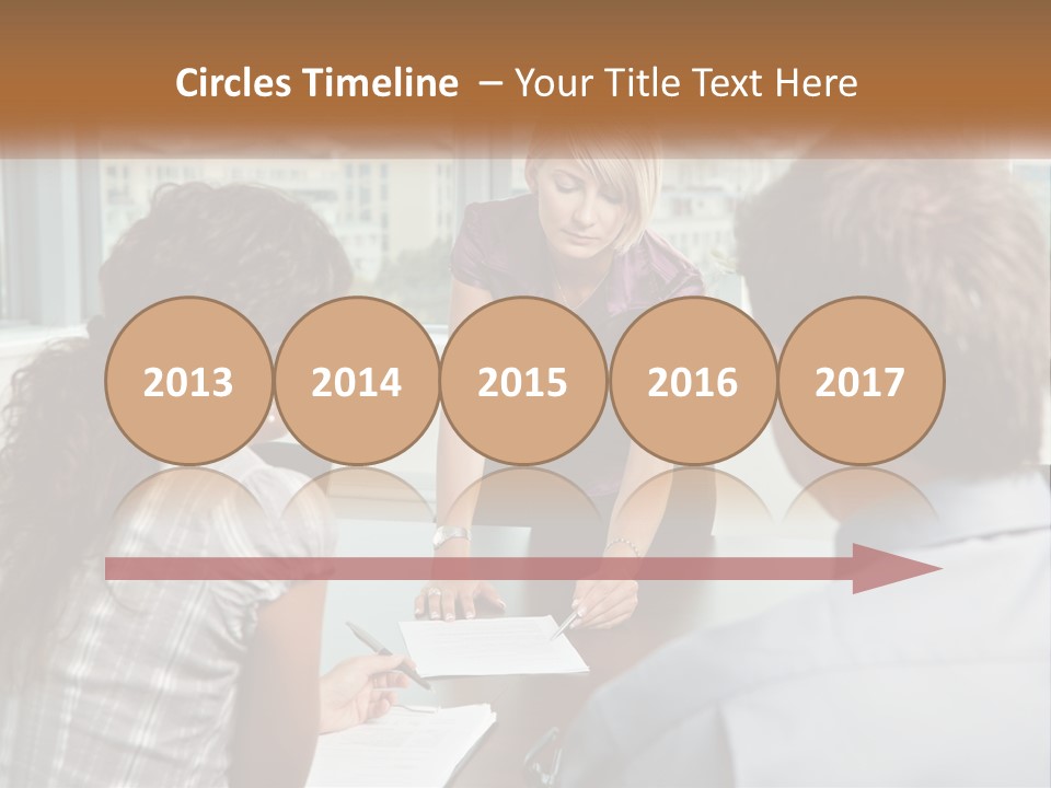 A Woman Sitting At A Table In Front Of A Man PowerPoint Template